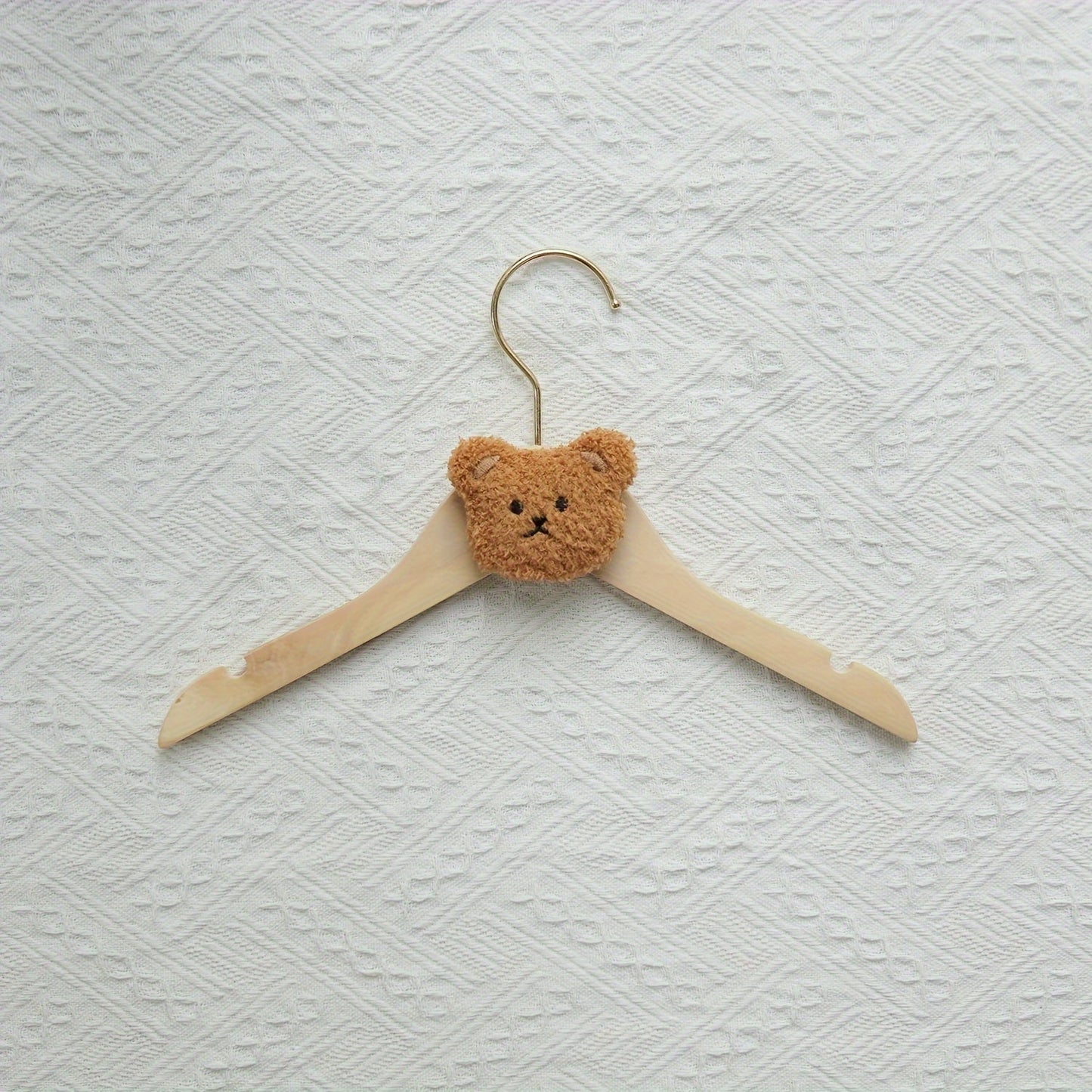 Durable and Lightweight Wooden Clothes Hangers featuring a Nordic Style Cartoon Bear Design, with Swivel Hooks for easy maneuvering. Recommended for Ages 14 and up.