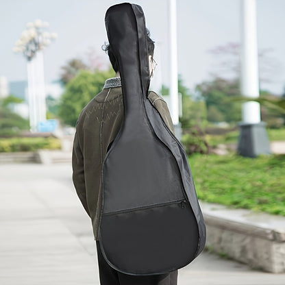 Waterproof 41-inch black acoustic guitar bag with adjustable shoulder strap and back hanging ring. Fits acoustic, electric, bass, and classical guitars (guitars not included).