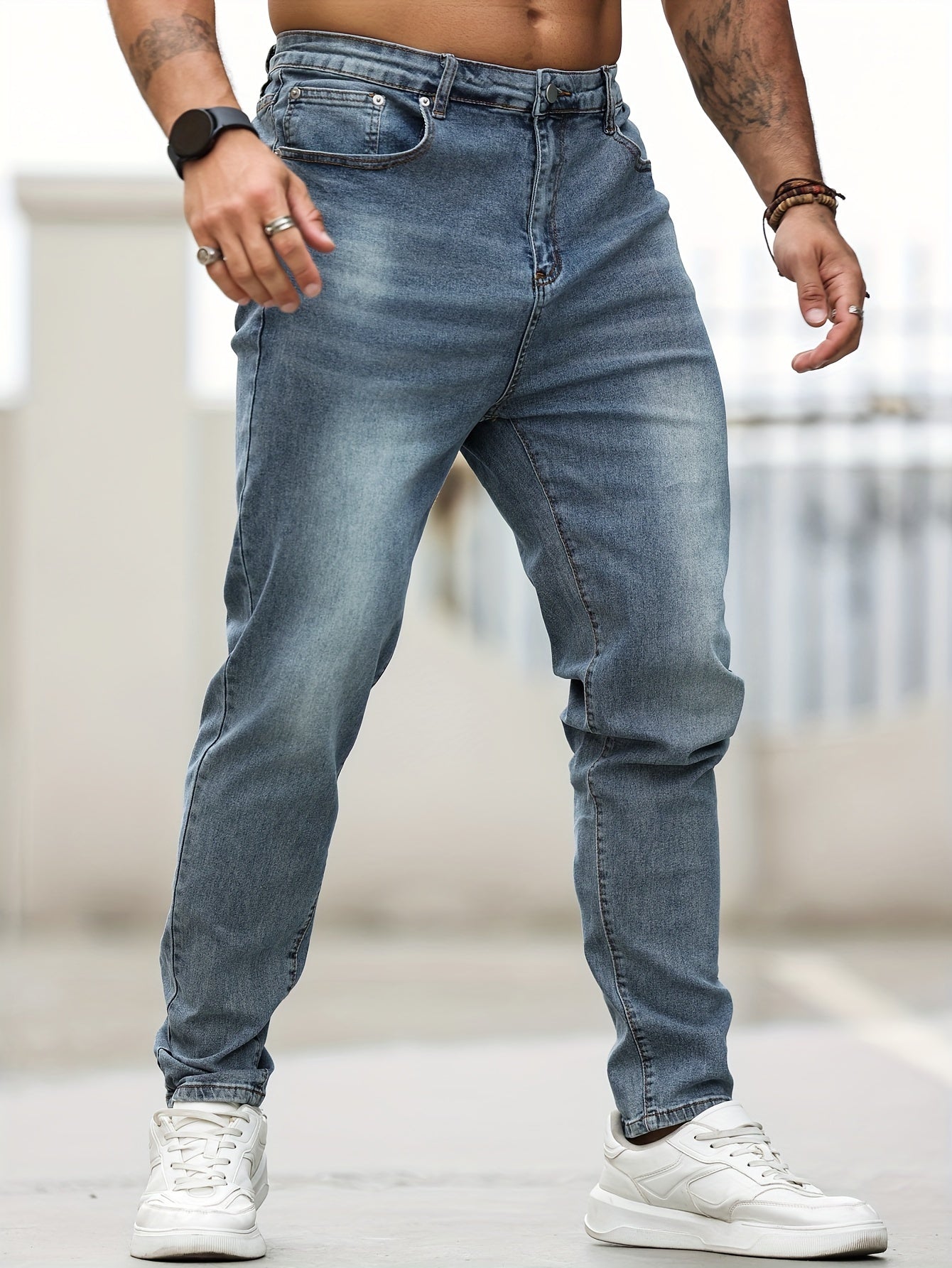 Men's plus size skinny jeans made of 68% cotton, 24% polyester, 6% tencel, and 2% elastane. Features casual solid color denim with pockets and medium stretch. Suitable for all seasons.