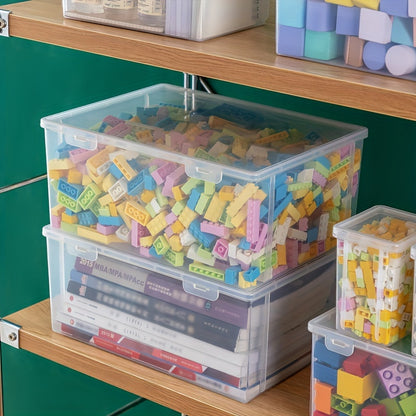 Durable plastic storage box with flip lid for building blocks, toys, and office supplies.