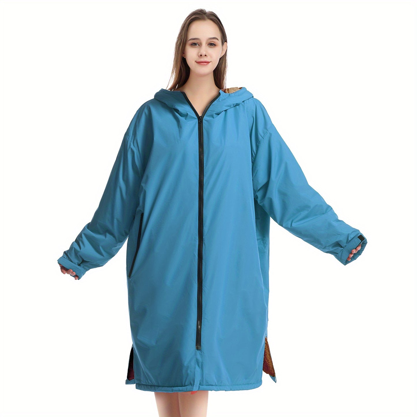 Waterproof, windproof unisex changing robe with fleece lining and hood for home, surfing, diving, camping, and hiking.