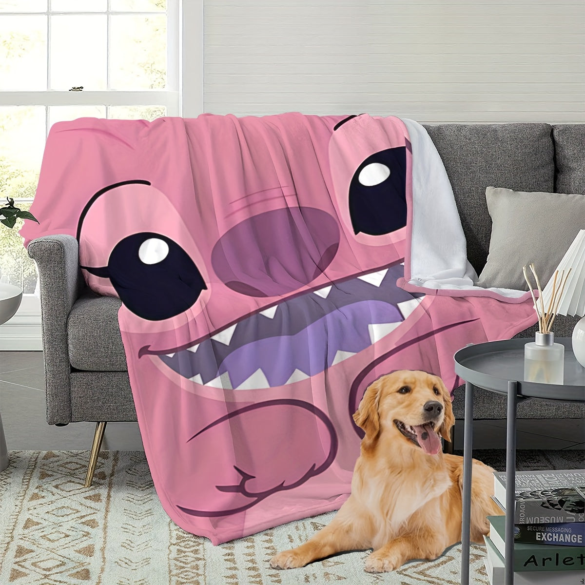 Pink plush throw blanket featuring a contemporary cartoon design. Made from soft polyester knit fabric, this multipurpose bedding is suitable for all seasons. Perfect for adding comfort to your bed, sofa, office nap, or as a travel blanket. Makes an