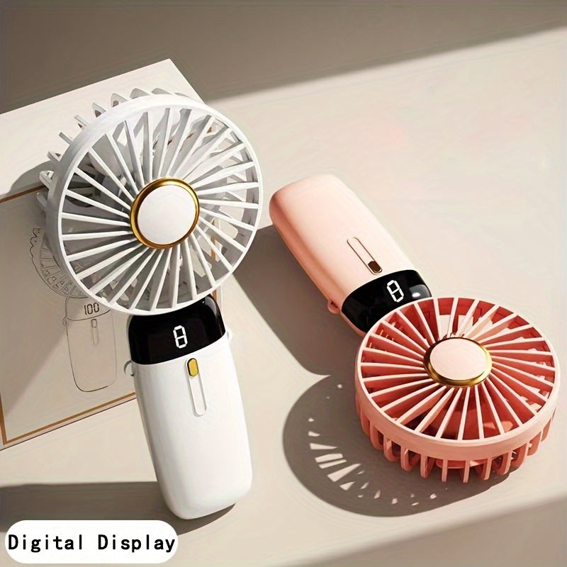 1 piece of USB Handheld Fan - A mini portable desktop folding small fan with a digital display. An essential summer item for back to school, RV outdoor camping, picnic, office, and travel.