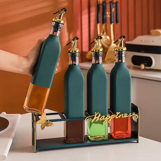 Set of elegant glass olive oil dispenser bottles, perfect for the kitchen. They are leakproof and must be hand washed. The set includes BPS-free square glass bottles with pourers, ideal for storing vinegar, soy sauce, and other seasonings. These bottles