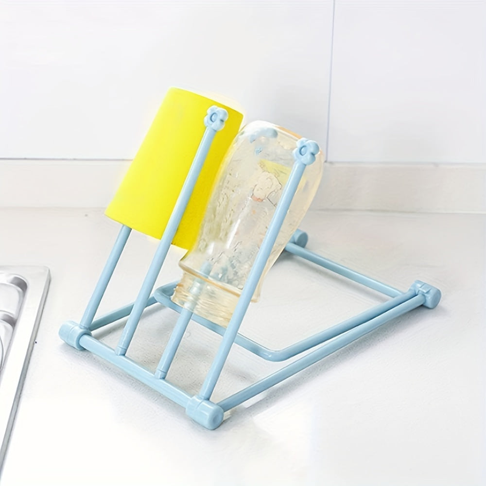 Foldable kitchen rag rack for drying dishcloths on the countertop, also functions as a towel bar rack and desktop waterlogging rag holder.