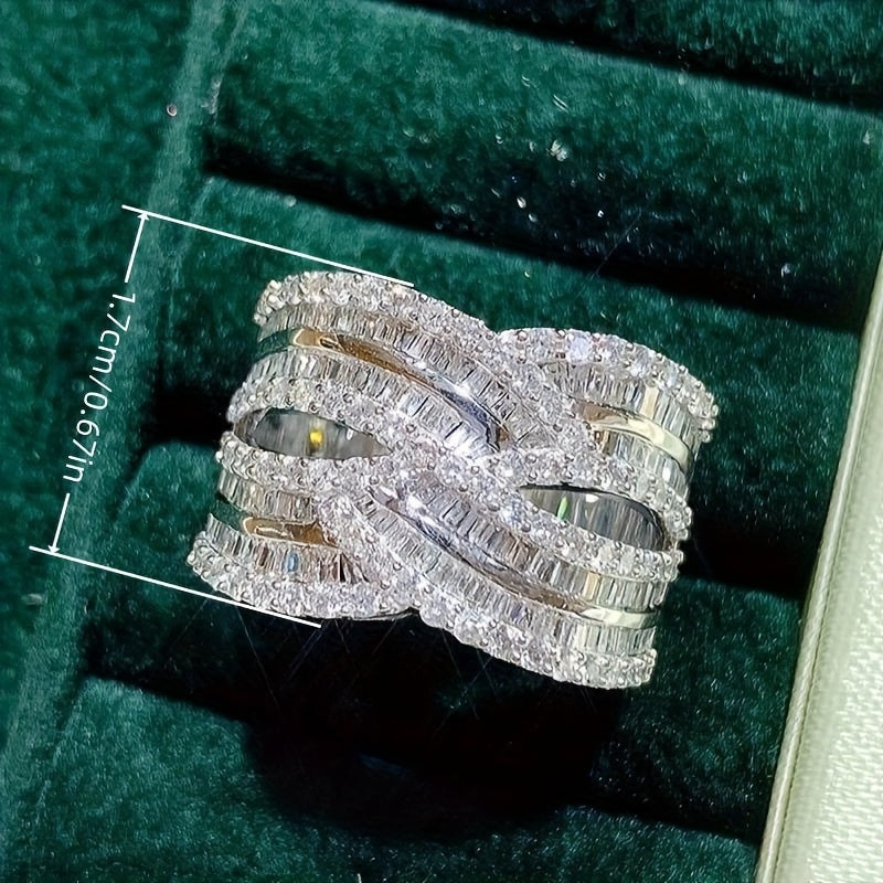 An exquisite and opulent wide-faced ring designed for women, adorned with shimmering zirconia stones, ideal for weddings, parties, anniversaries, and any special event.