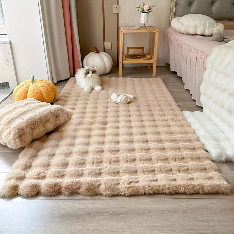 This high-pile plaid carpet in winter features a soft pink rabbit faux fur touch, making it warm and fluffy. The non-slip faux fur rug is perfect for adding a cozy touch to your living room. Measuring 60 x 120 cm, it is the ideal size for any space.