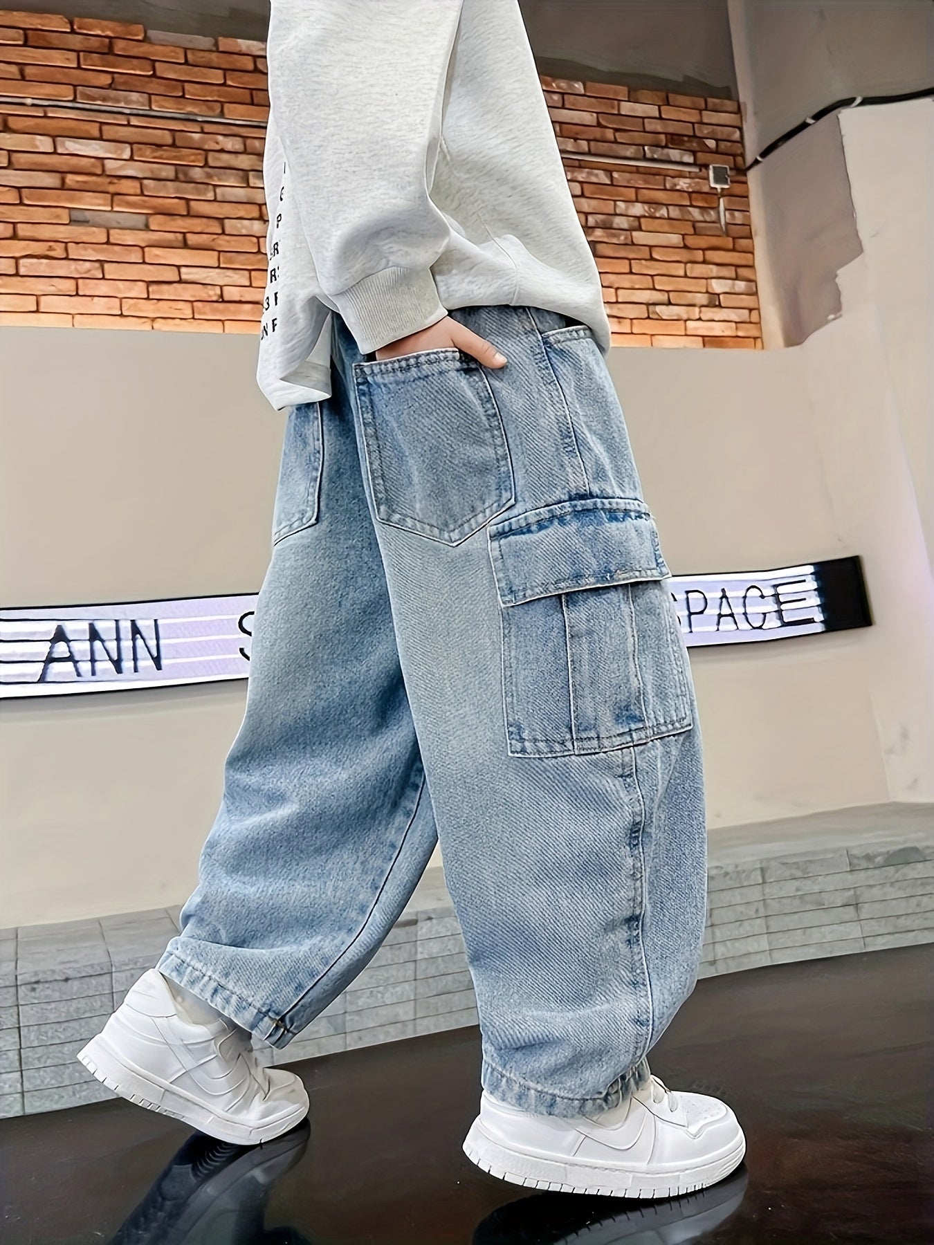 Boys' trendy cargo denim jeans with an elastic waist, comfort fit, pockets, durable cotton/polyester blend, perfect for outdoor activities and casual attire.