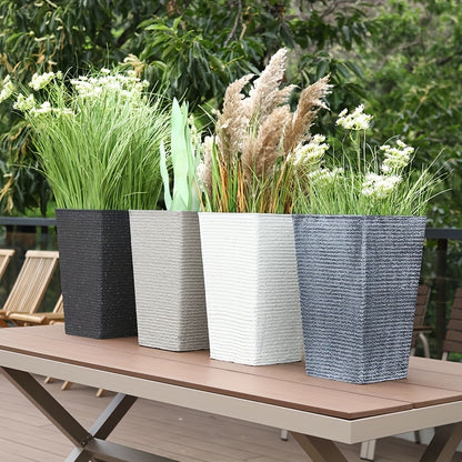 Large tall planter for outdoor or indoor use.