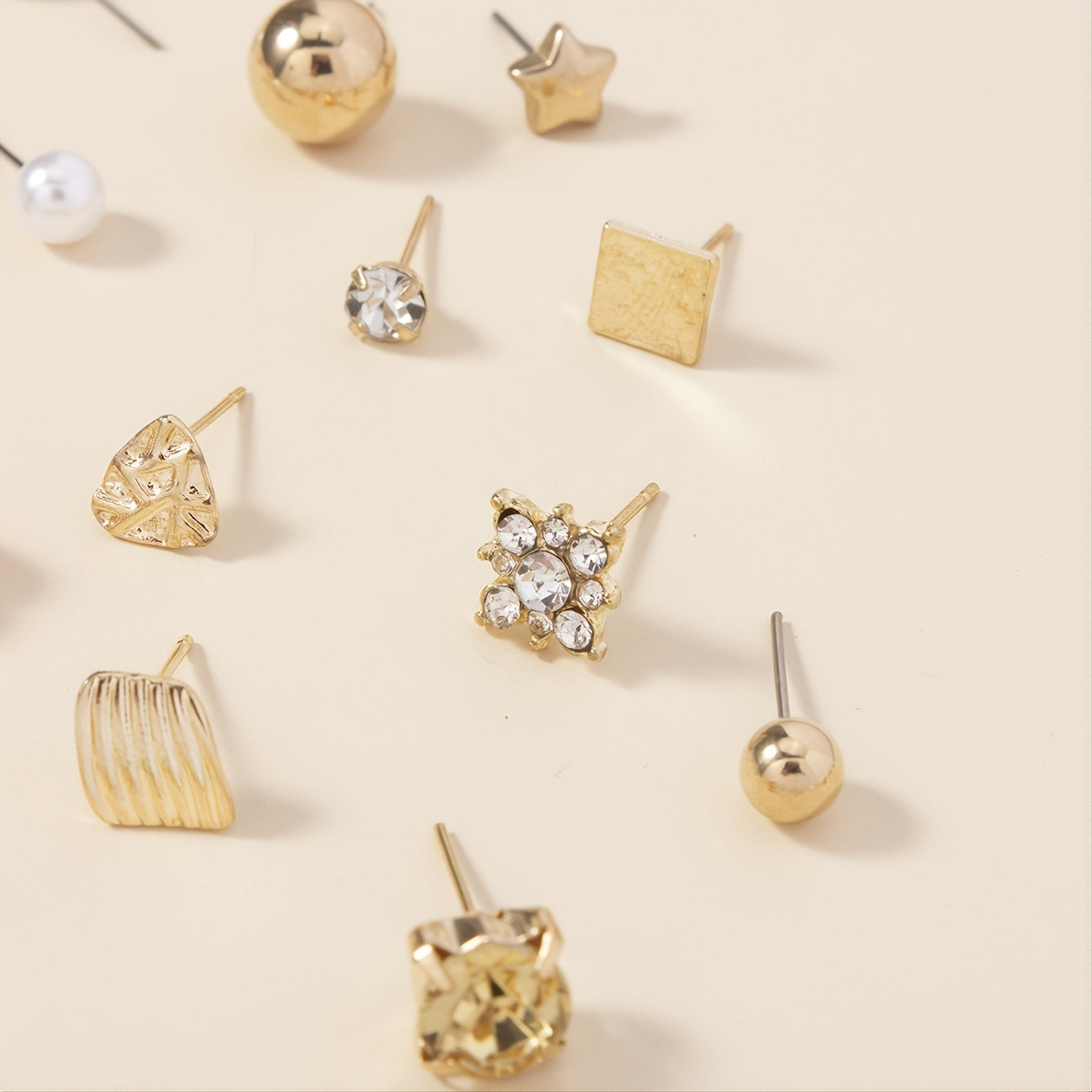 Set of 30 pairs of stud earrings, featuring a combination of alloy material, full rhinestones, faux pearls, and round love letters.