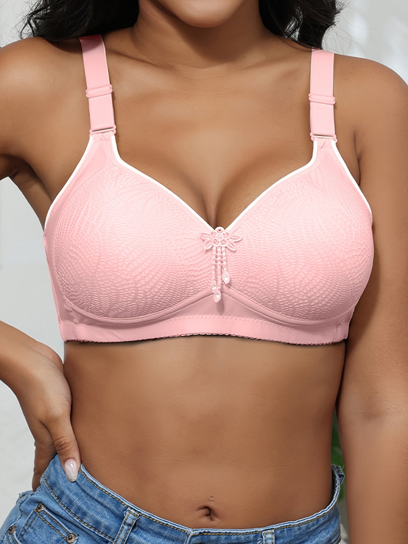 Printed, mature-style full-coverage bra with adjustable, wireless design and secure closure.