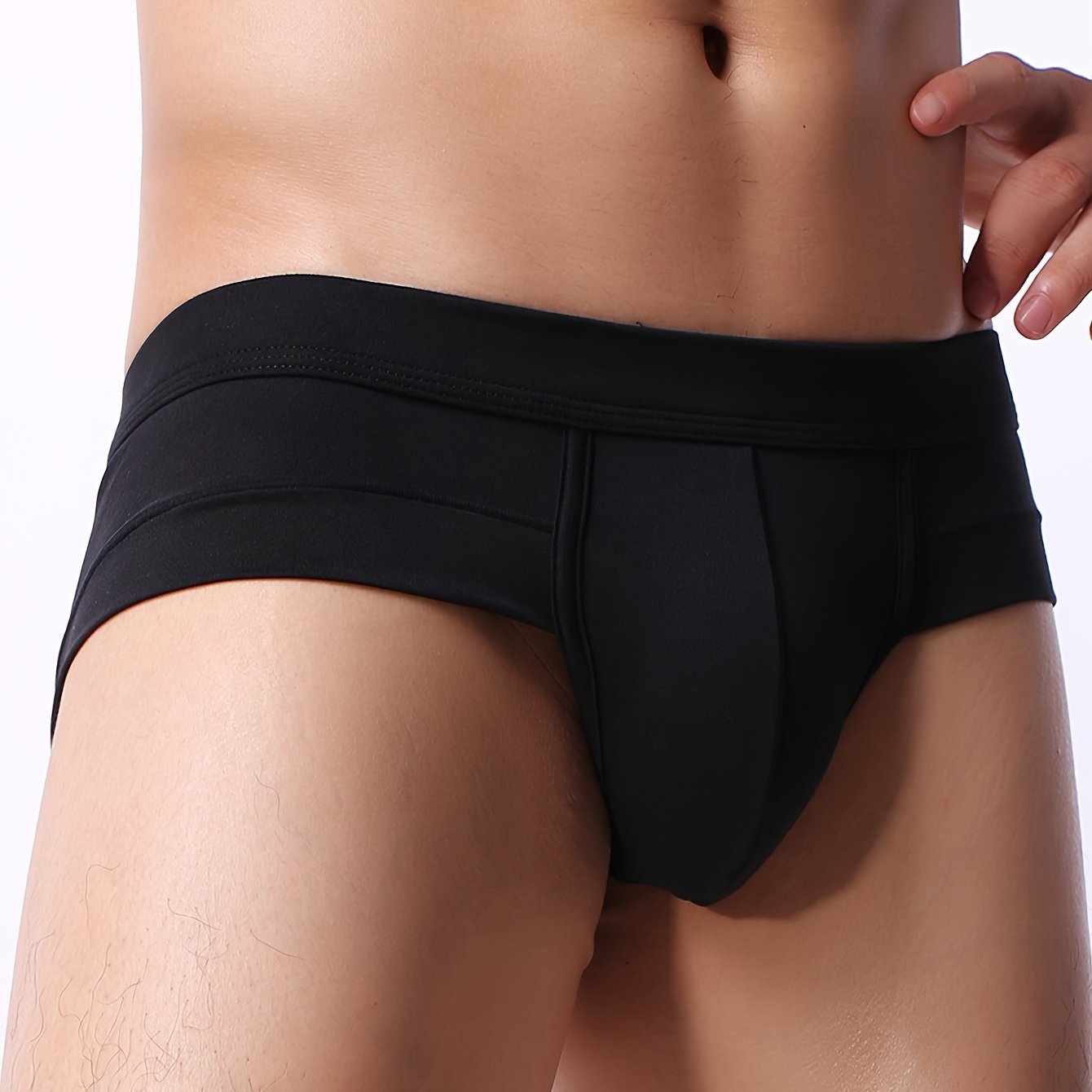 Men's viscose blend briefs with solid color, medium stretch knit fabric, large pouch, comfortable, skin-friendly material, and casual style.