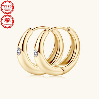 These stylish women's hoop earrings are crafted from 925 sterling silver and adorned with 2.5mm Mozambique stones. The simple yet fashionable design features a circular shape, weighing a total of 4.36g in silvery color. Each earring is embellished with 2