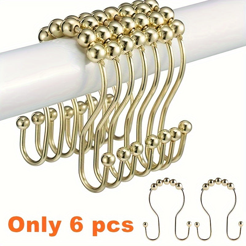 Set of 6 stainless steel shower hooks with double glide design for easy opening and closing, compatible with most rods and liners.