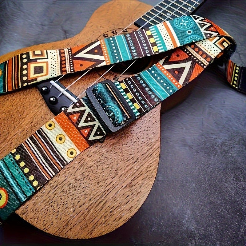 Bohemian Tribal Pattern Adjustable Guitar Strap made of faux leather and thick polyester, with secure locking system. Compatible with electric guitar, bass, and ukulele. Durable shoulder