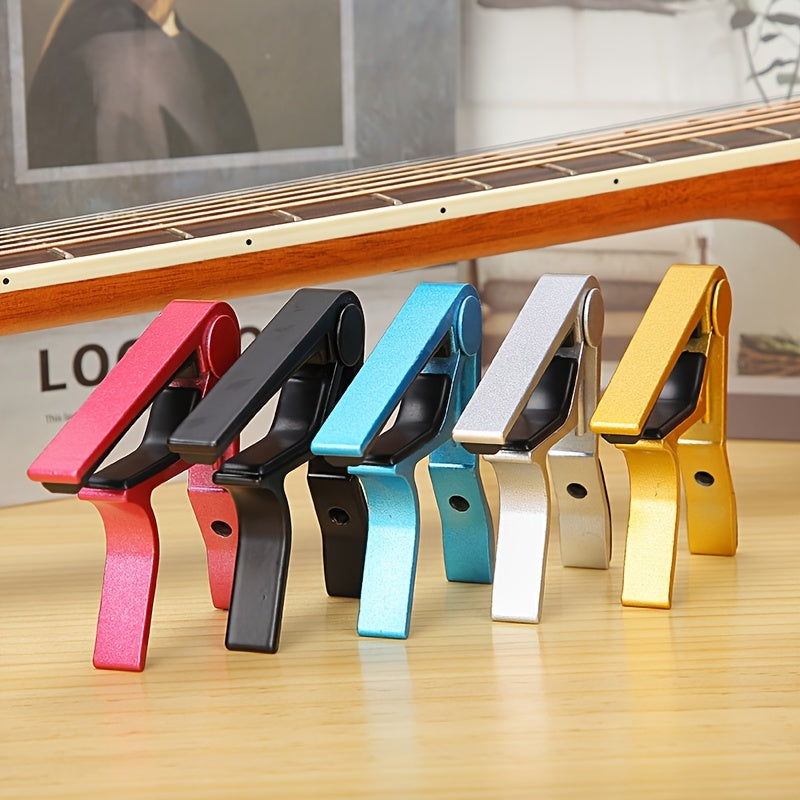 Aluminum alloy guitar capo for acoustic, classical, electric guitars and ukuleles, quick change with tone adjustment.