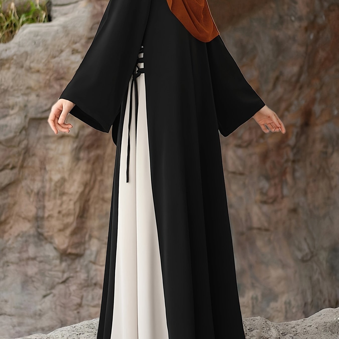 Kaftan dress with color block lace-up sides, loose fit, and long sleeves, without headscarf.