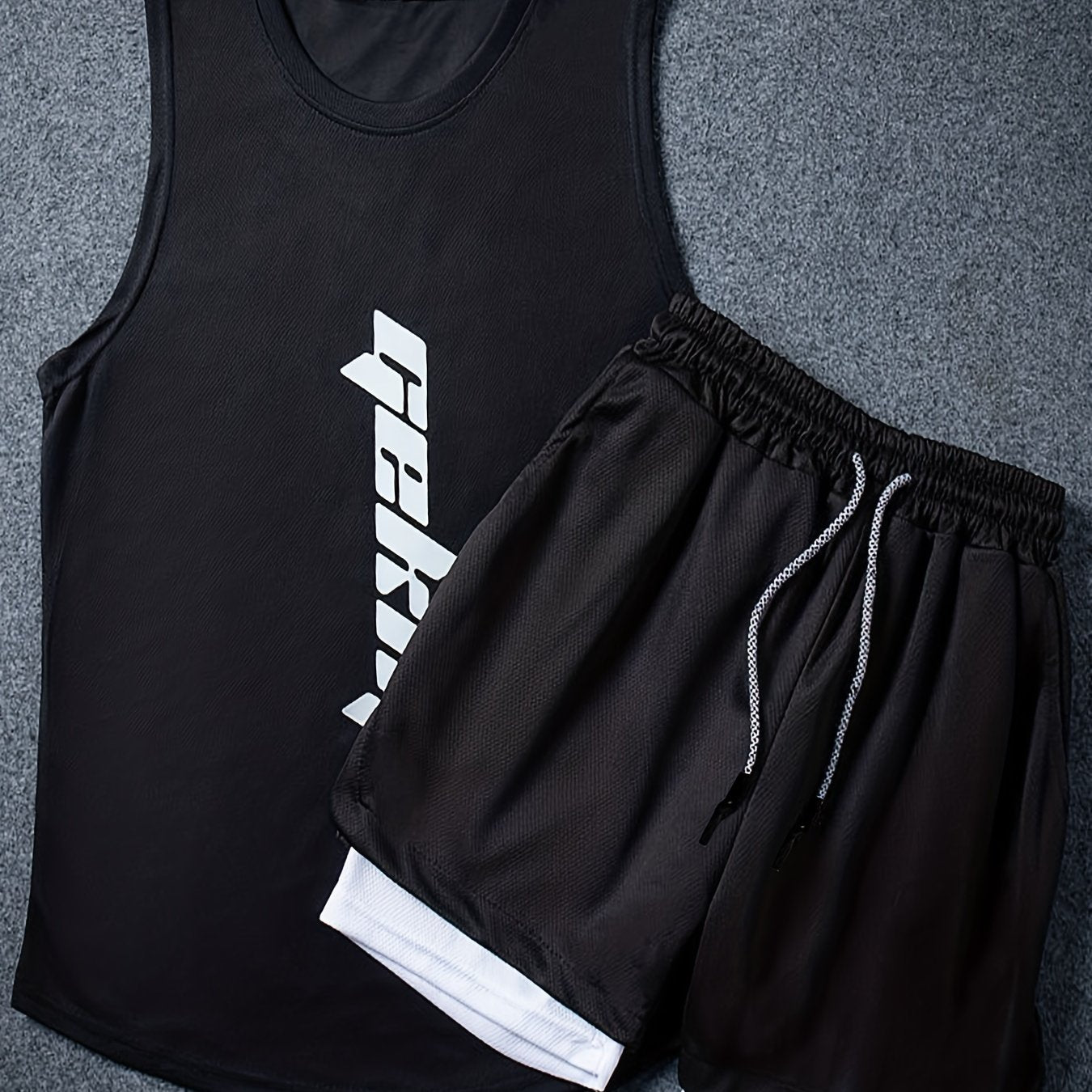 Men's 2-piece basketball outfits with letter print, casual graphic tank top and loose drawstring 2-in-1 shorts set.