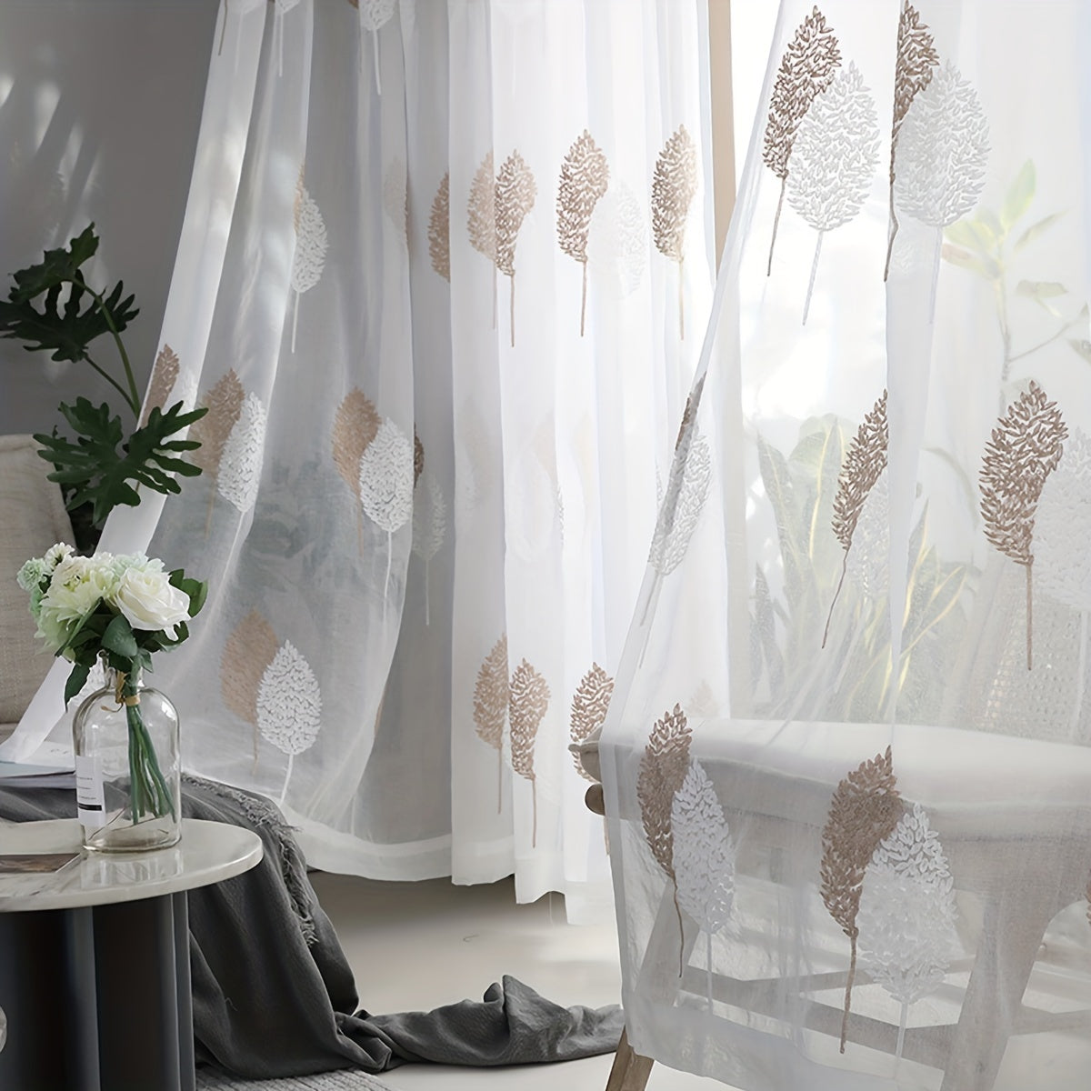 Add a touch of pastoral elegance to your home with this beautiful sheer curtain featuring delicate leaf embroidery. This translucent tulle curtain is easy to hang with a rod pocket design, perfect for adding a subtle touch of style to your living room or