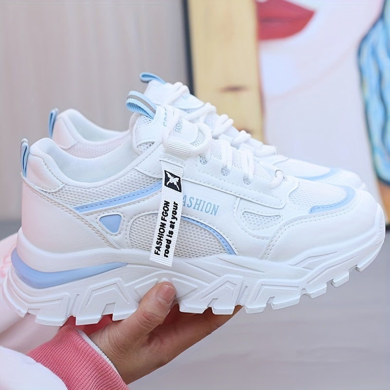 Women's white sneakers with low top lace-up, mesh upper, breathable fabric insole, and durable PVC sole for casual and sporty wear. Casual and trendy footwear.