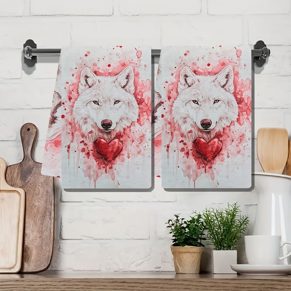 Set of 2 Ultra Soft Kitchen Towels featuring a Valentine's Day Wolfy design. These highly absorbent and machine washable dish hand towels measure 40.64x60.96 cm. The contemporary white towels are accented with red splashes and a heart detail, perfect for