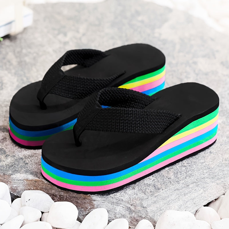 Summer clog flip flops with high heels and rainbow sole for seaside vacation.