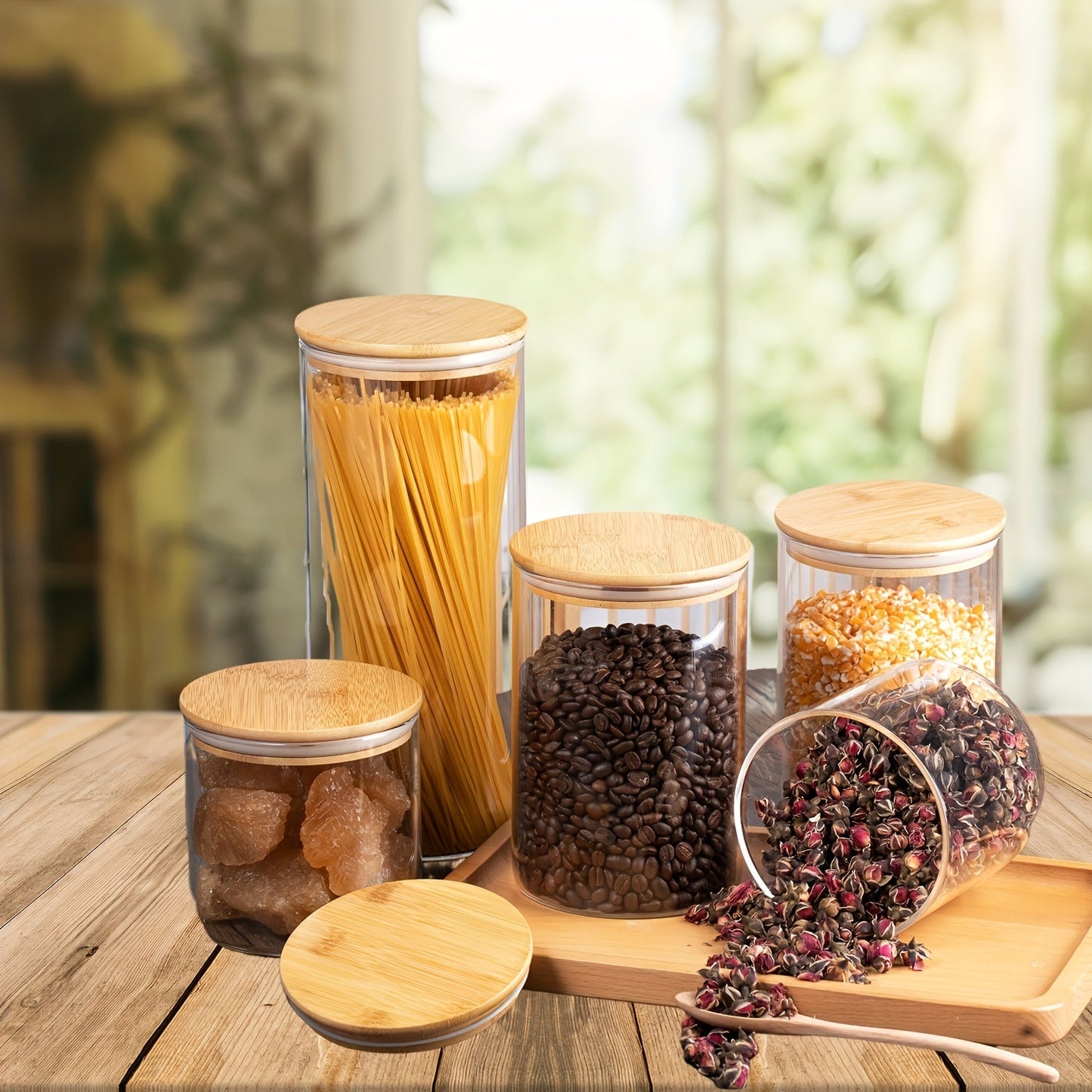 Set of 5 glass food storage jars with bamboo lids, perfect for storing dry goods such as pasta, tea, and nuts. These airtight kitchen canisters are made from high borosilicate glass with a large capacity. No electricity is needed to use these food-safe