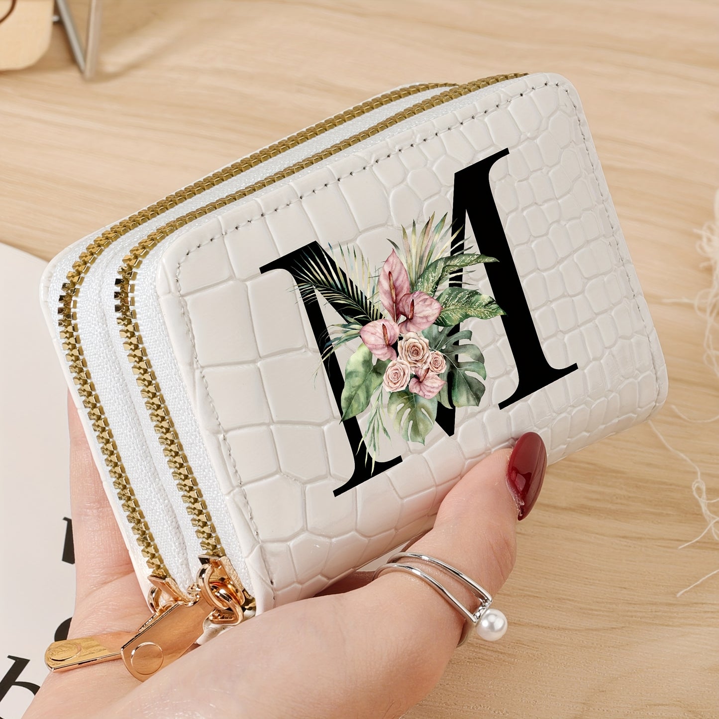 Women's credit card wallet with elegant floral letter print in black & white. Features large capacity, dual zipper, crocodile texture PU, lightweight design with nylon lining for everyday