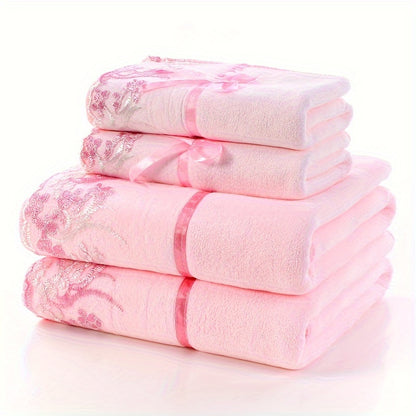 4-piece lace embroidery towel set includes 2 bath towels and 2 hand towels. Soft and absorbent, perfect for bathrooms.