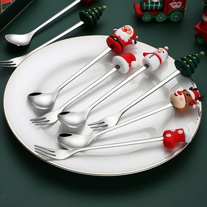 Set of 4 stainless steel coffee spoons with Santa and reindeer designs for Christmas dining.