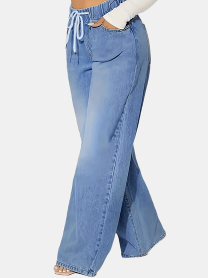 Women's light blue elastic waist drawstring washed stretchy straight-leg wide-leg jeans with slant pockets.