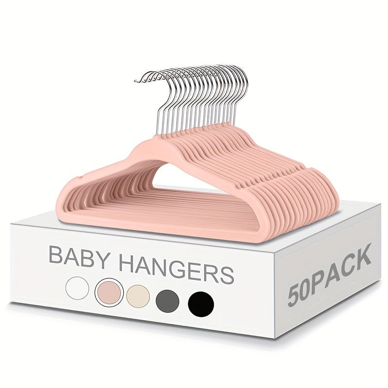 Get a 50 pack of cute and durable velvet baby hangers for your closet! These non-slip toddler hangers are the perfect size at 29.97 cm for your child's clothes. Perfect for newborns and children.