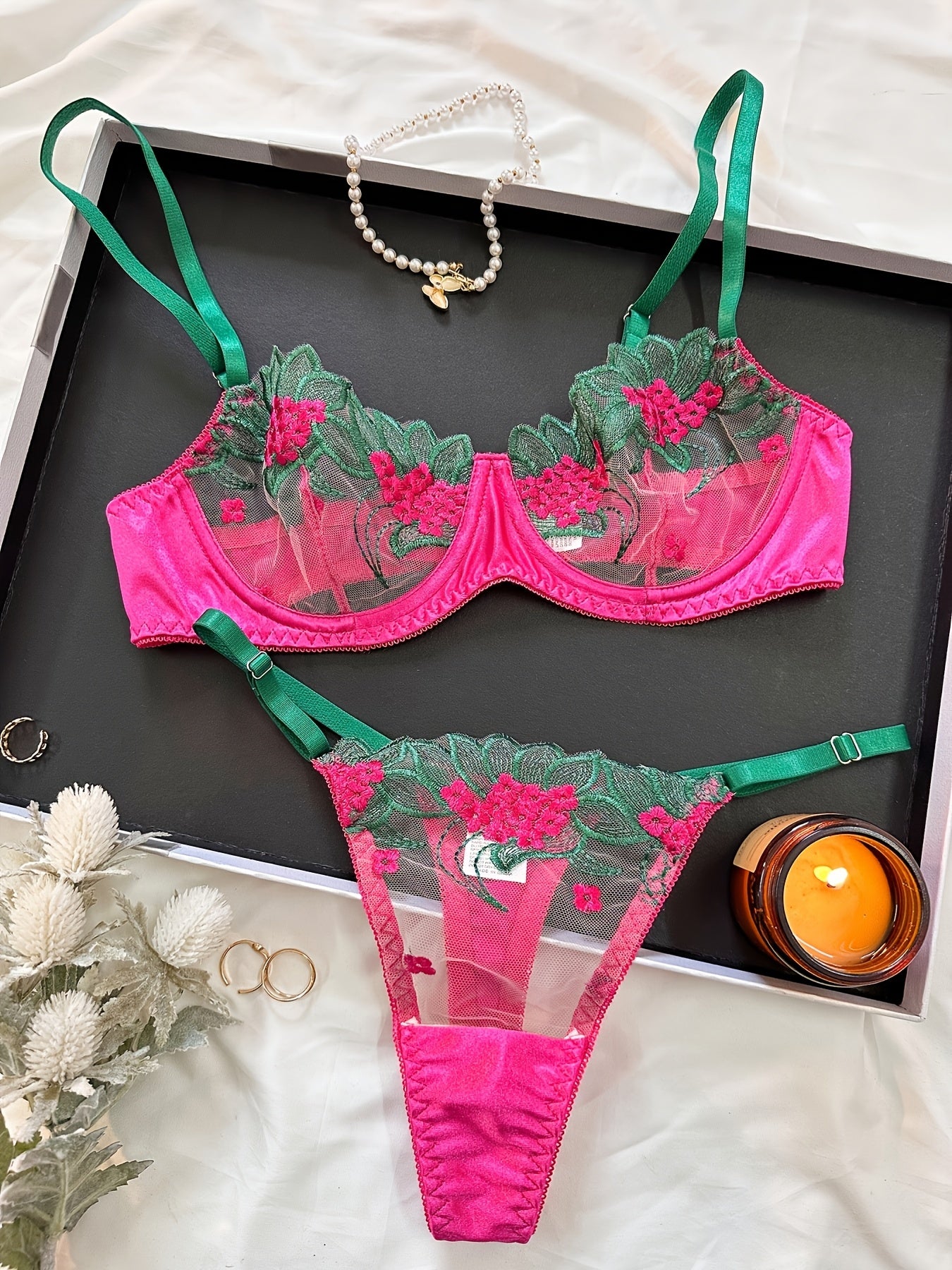 Floral embroidered mesh lingerie set for adult women, made of 95% polyester and 5% elastane.