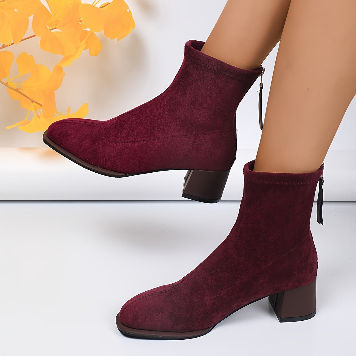 Elegant ankle booties for women with square toe, flannel upper, rubber sole, block heel, and zipper closure - ideal for fall season comfort.