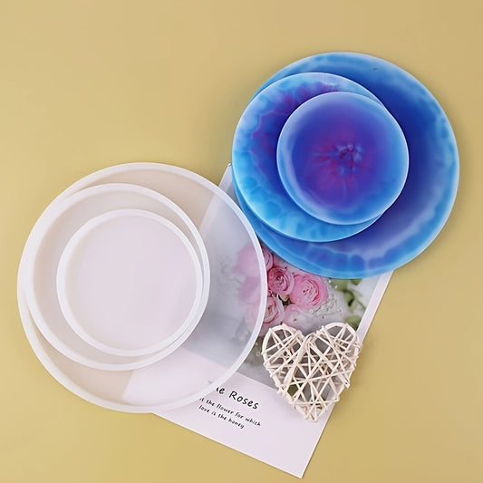 DIY round silicone mold for epoxy resin coasters and trays in marbled blue, purple, and white design. Perfect for crafting home decor.