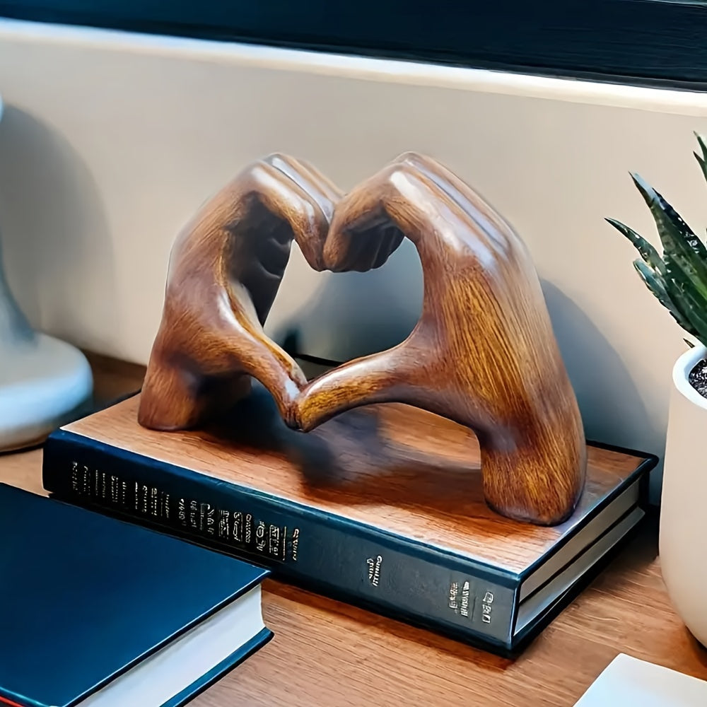 Heart-shaped resin sculpture for home or office decor. Perfect gift for holidays or special occasions.