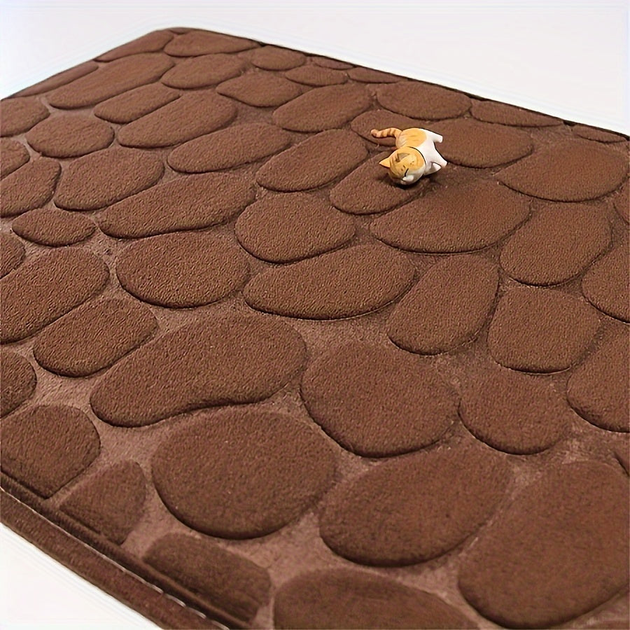 One piece of bath mat with embossed pebble pattern, highly absorbent and non-slip for bathroom use. Suitable for tub, toilet, and floor, made of machine washable polyester material. Dimensions are 59.94x39.88 cm.