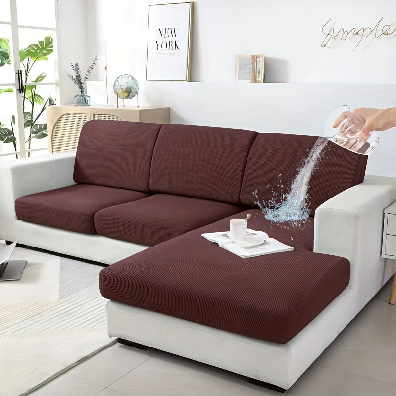 Modern Stretch Sofa Cover made of polyester and spandex blend. Machine washable with elastic band closure. Integrated design fits most sectional sofas in the living room.