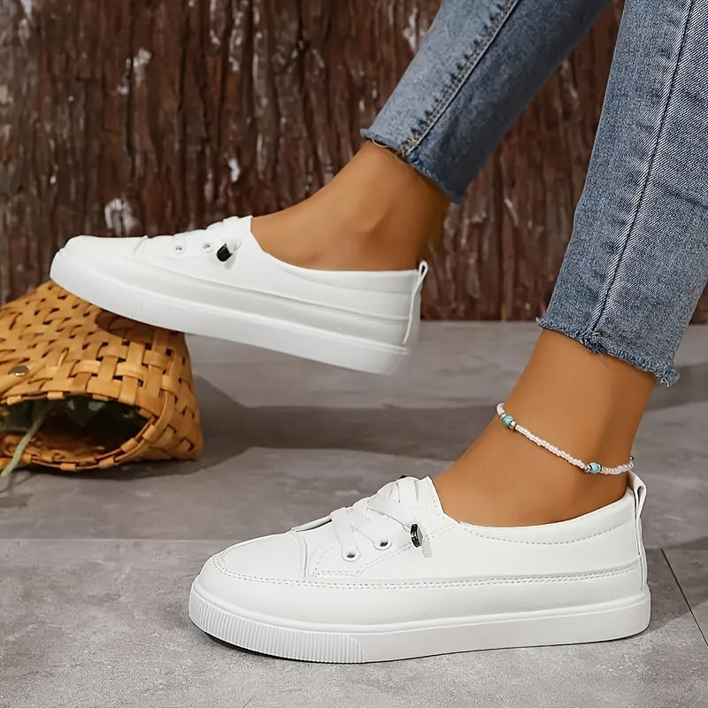 White slip-on sneakers for women, perfect for everyday wear.