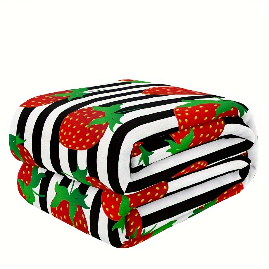 Black striped 1-piece Strawberry Printed Fleece Throw Blanket made from soft microfiber material with a durable twill weave. This all-season blanket features a digital print, is lightweight, and weighs between 250-300g. Perfect for adding a touch of