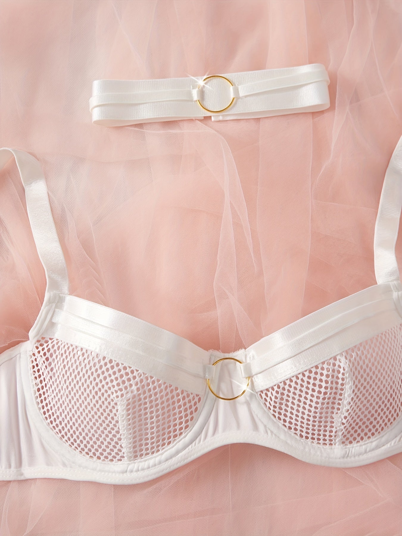 Mesh see-through lingerie set with leg straps, including bra and thong – sexy women's intimates.