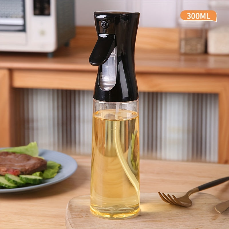 Oil spray bottle for home use, ideal for cooking, suitable for various uses in the kitchen.