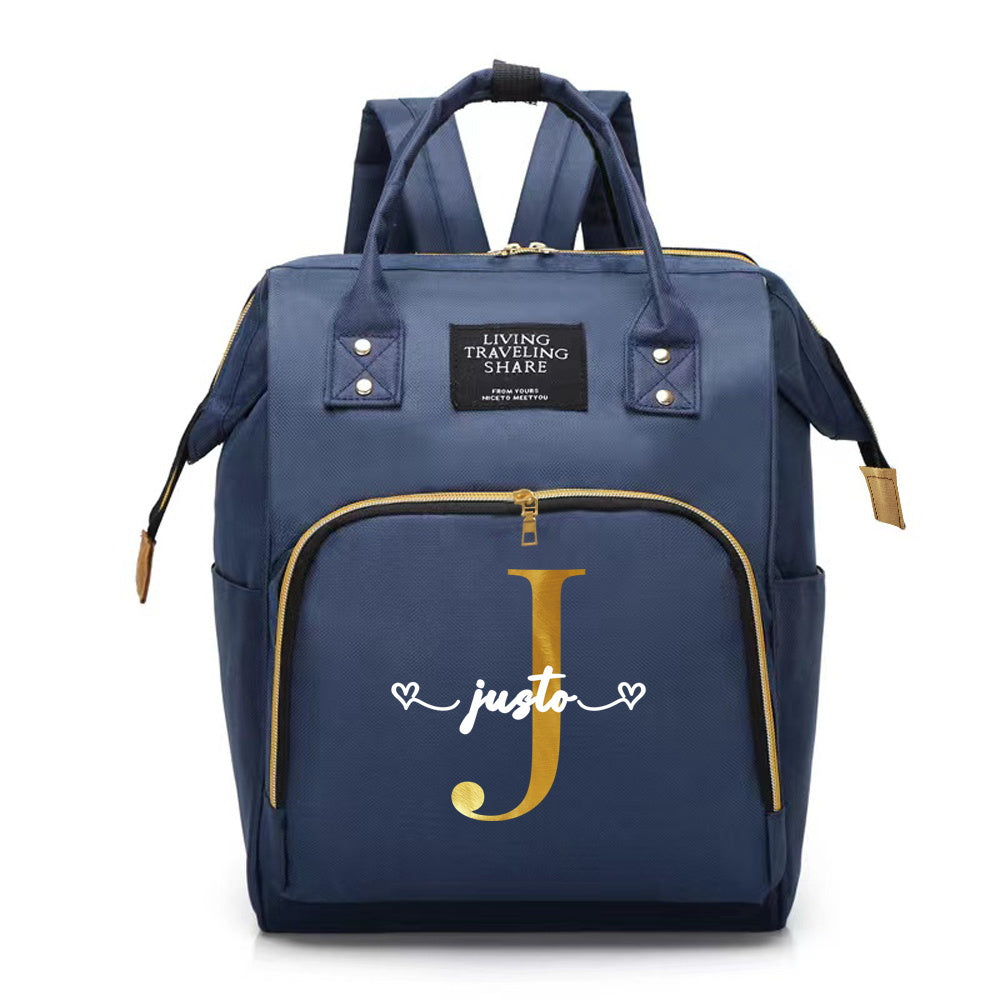 Customize your Oxford cloth diaper bag with your own initial, featuring a large capacity and soft shell. This mommy backpack is perfect for casual travel and comes with a convenient bottle nursing storage organizer for women.