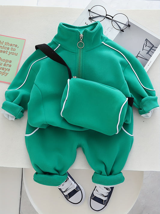 Trendy boys' sports casual outfits with zip-up stand collar sweatshirt and pants set, including a free satchel bag. Perfect for outdoor activities.