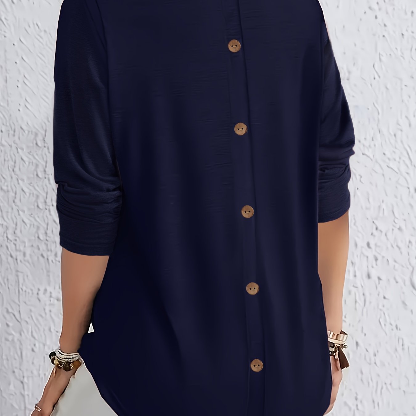 Elegant long-sleeve tops for plus-size women with button detail on the back, perfect for spring and autumn.