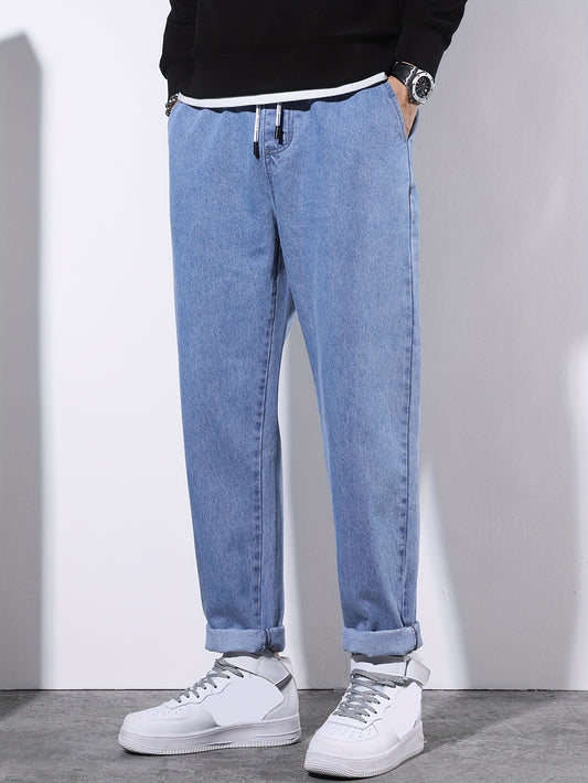 Men's casual denim pants with pockets, drawstring waist, and cotton blend fabric - perfect for outdoor activities.