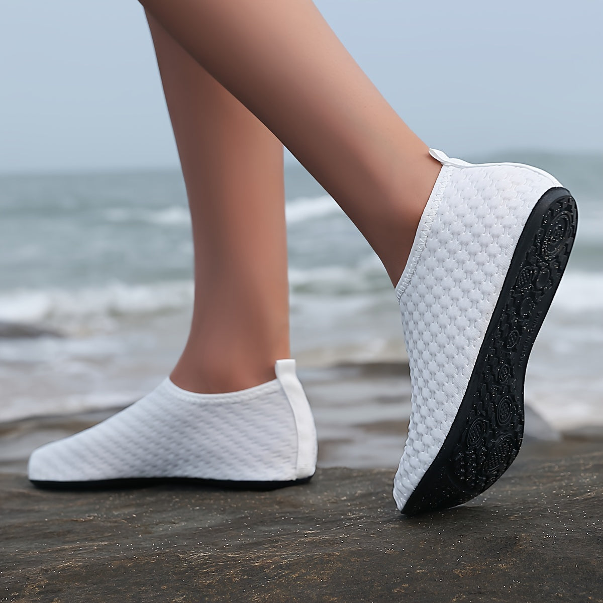 Durable slip-on water shoes for women, perfect for swimming, surfing, boating, fishing, and beach activities.