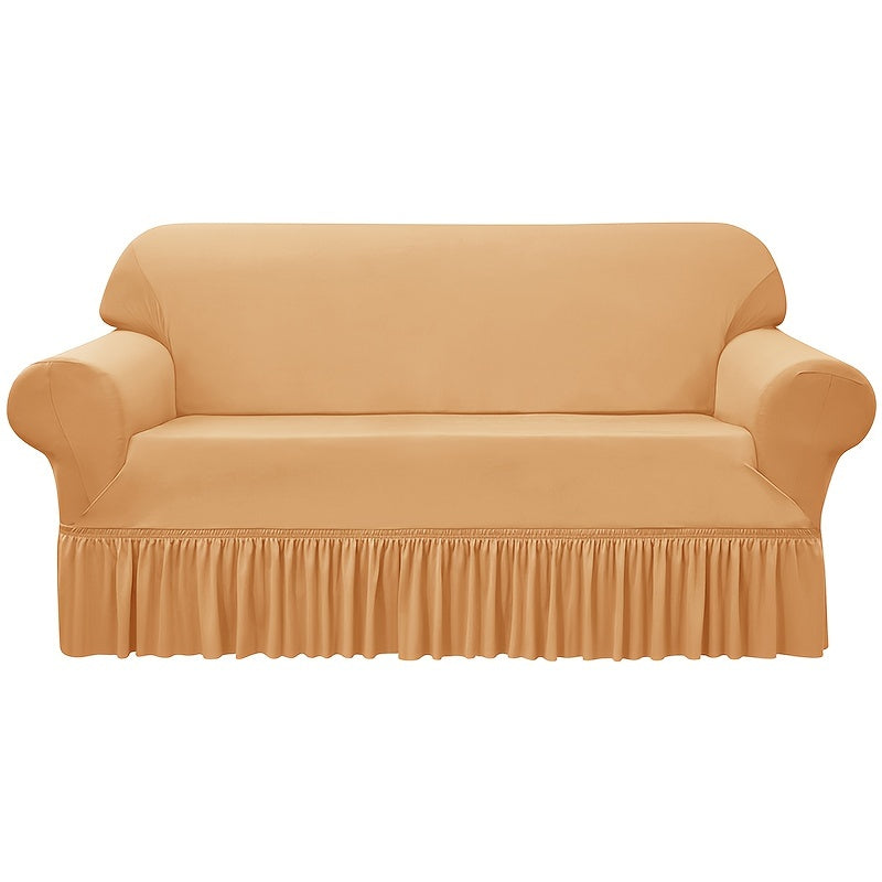 Elastic waterproof sofa slipcover with skirt for all seasons, ideal furniture protection for home and office.