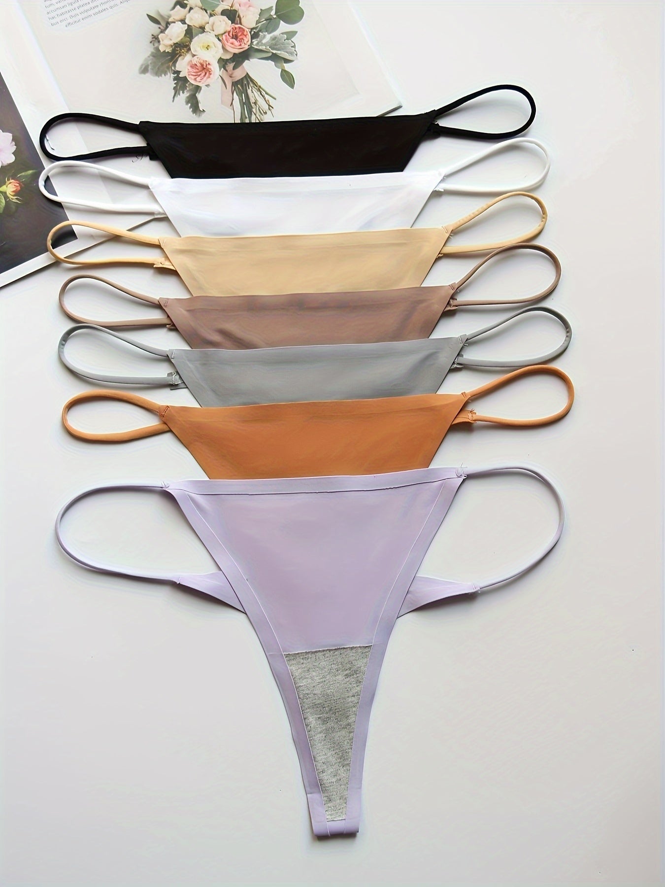 7 pairs of low-waisted thong belts in plain colors, soft and sexy lady's underwear