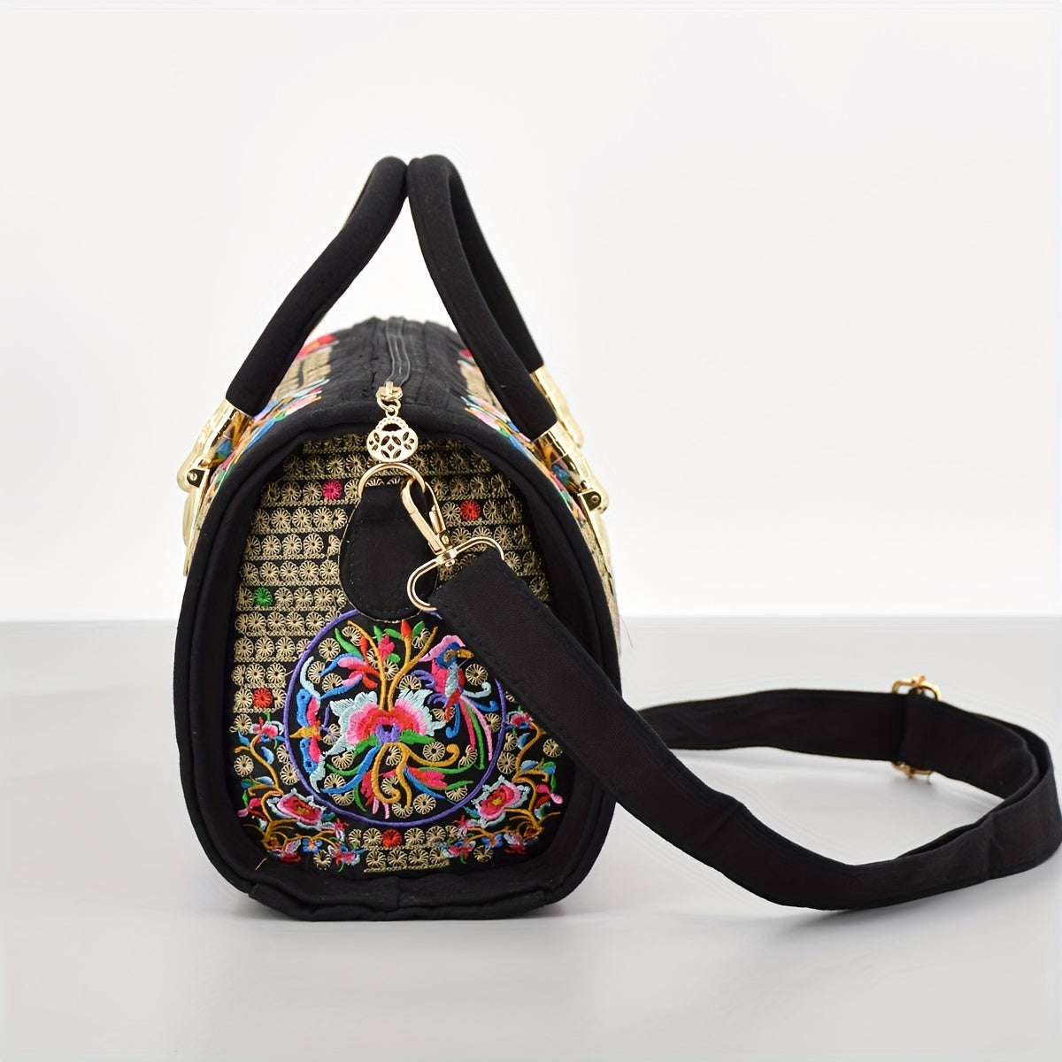 Vintage embroidered Boston bag with retro bohemian tote style for women.